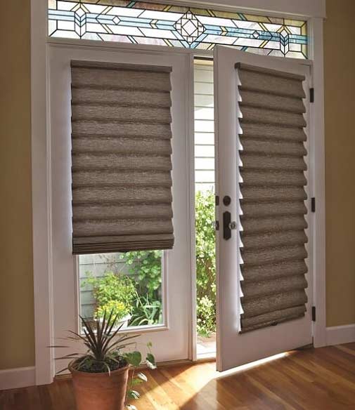 These dreamy shades make a home cozier, filtering in sunlight through the door.