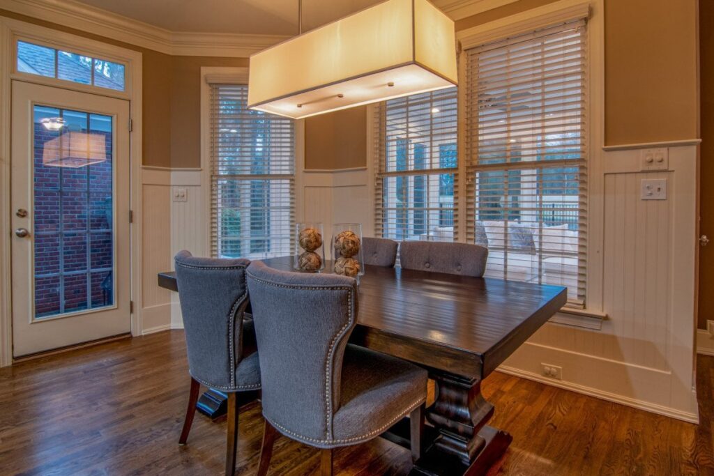 Wooden shutters in a living room helps you control natural light