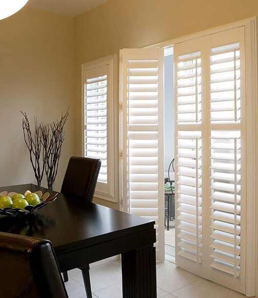 Vinyl shutters allowing the light to sink inside a room